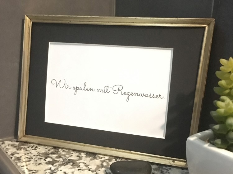 Reisebüro Andreas Steif, Schild Regenwassernutzung